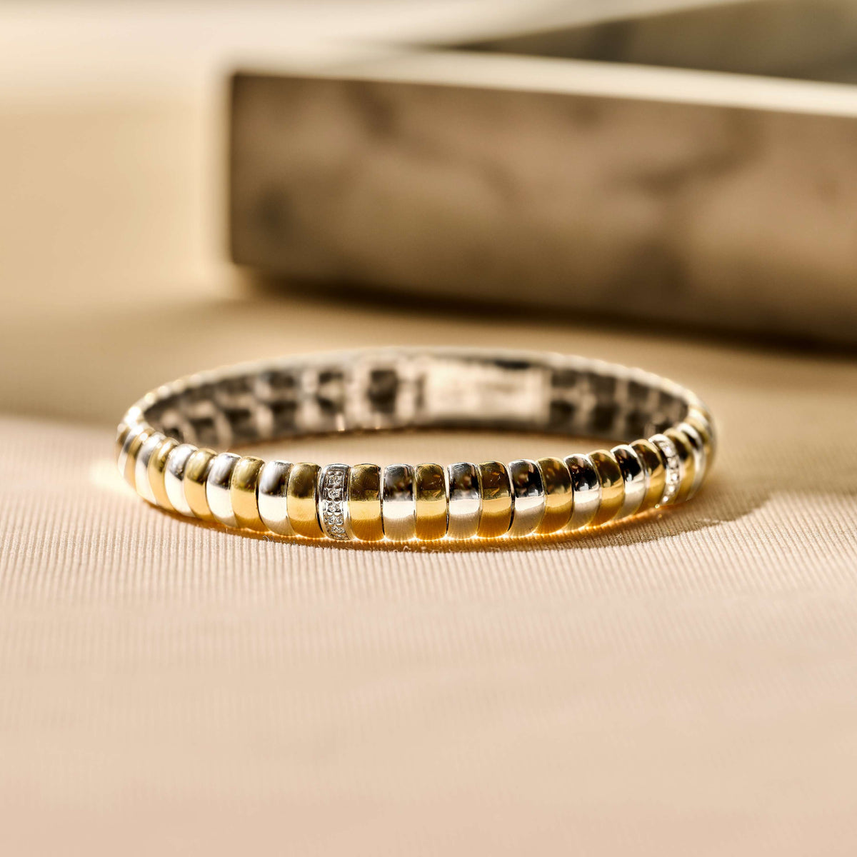 Gold Vermeil and Sterling Silver Two Tone link bracelet with cubic zirconia, styled