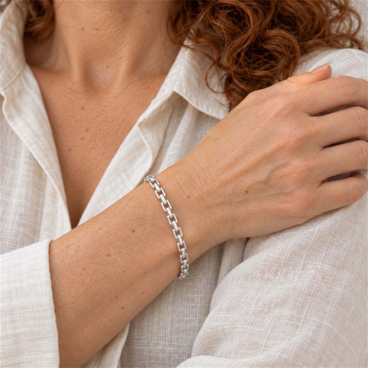 Sterling Silver 4.9mm Box Belcher Bracelet worn by the Urban Armour model with cream linen shirt