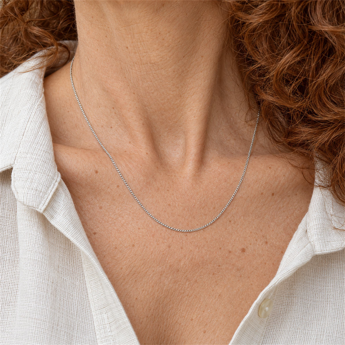 9ct White Gold 1.1mm Curb Chain, Adjustable 16, 17 or 18 Inches worn by the Urban Armour model with cream linen shirt