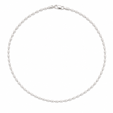 Load image into Gallery viewer, A silver beaded chain necklace arranged in a circle on a plain white background.
