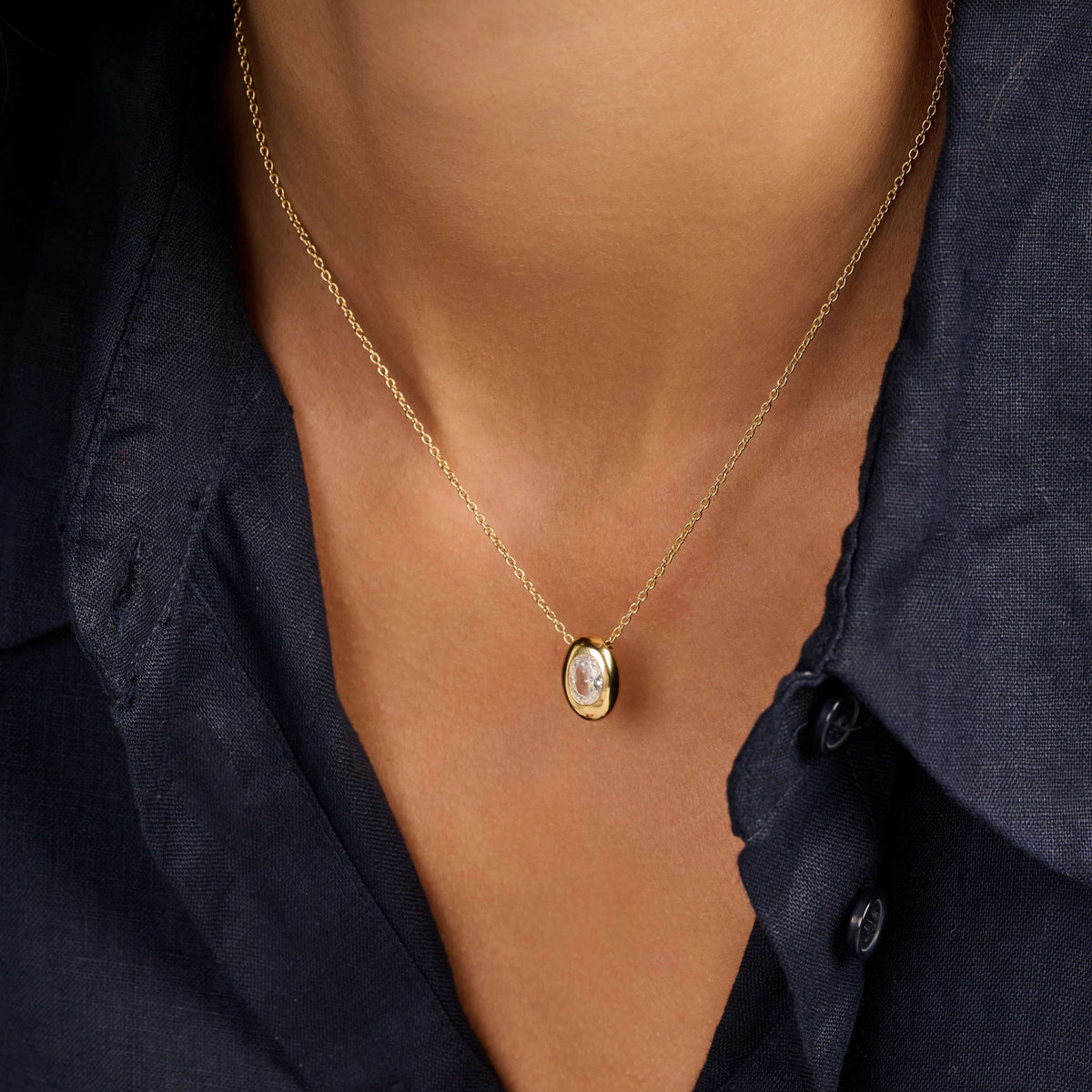 Gold Vermeil oval cubic zirconia pendant, styled