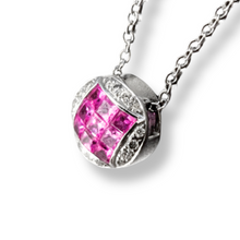 Load image into Gallery viewer, Pink Sapphire and Diamond 18ct White Gold pendant on a white background.  The pendant is round with a square of 9 pink saphires in the middle and the outside filled in with 16 smaller diamonds

