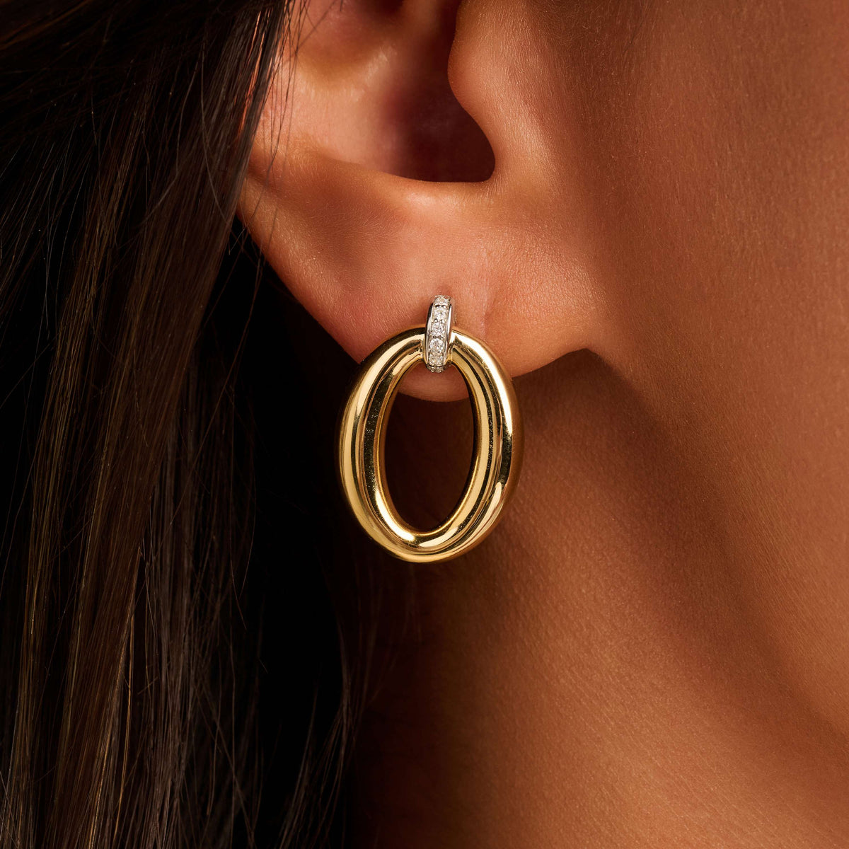 Gold Vermeil soft oval drop earrings with cubic zirconia, styled