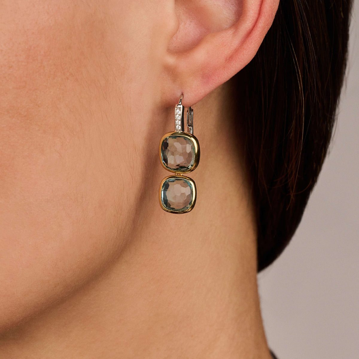Gold Vermeil double blue cushion stone drop earrings, worn