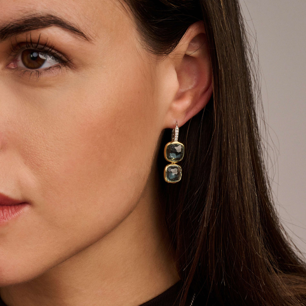 Gold Vermeil double blue cushion stone drop earrings, worn