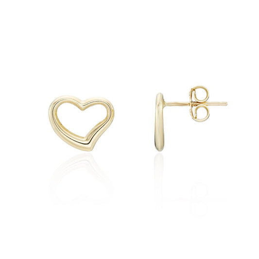A pair of gold heart stud earrings, with one shown from the front displaying an open heart design and the other from the side showing the post and butterfly back, on a white background with a soft reflection.