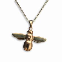 Load image into Gallery viewer, Close up of rose gold vermeil bee pendant on long silver chain
