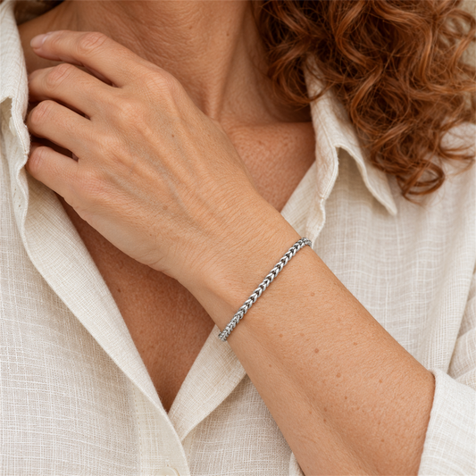 Sterling Silver 4.15mm Dovetail Bracelet worn by the Urban Armour model with cream linen shirt
