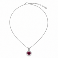 Load image into Gallery viewer, A silver chain necklace with a circular bezel setting holding a round, deep red gemstone, displayed on a clean white background.
